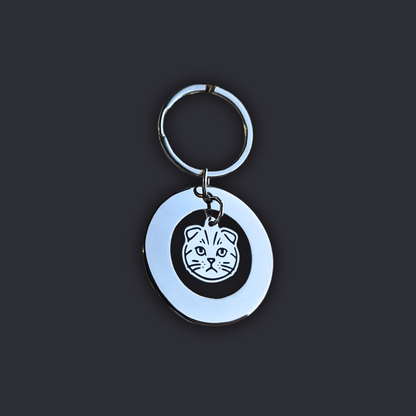 Llavero Plateado Circular + Dije GATO