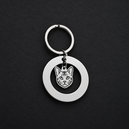 Llavero Plateado Circular + Charm GATO